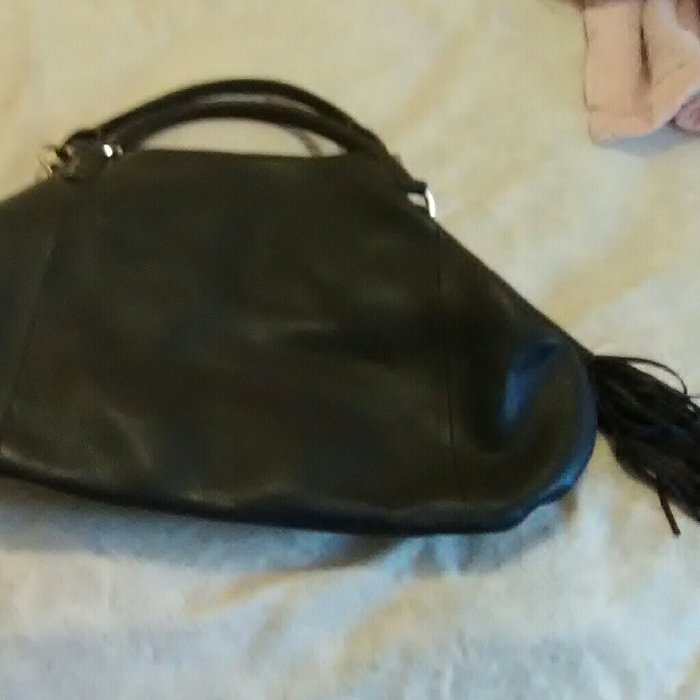 Genuine leather handbag  .pouch is 12 inches tall